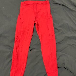 Red drawstring activewear leggings